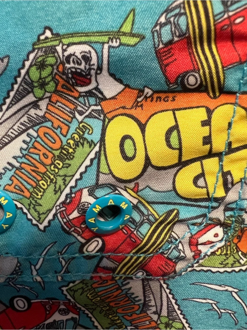 Turquoise Graphic Swim Shorts with Yellow Ocean Print